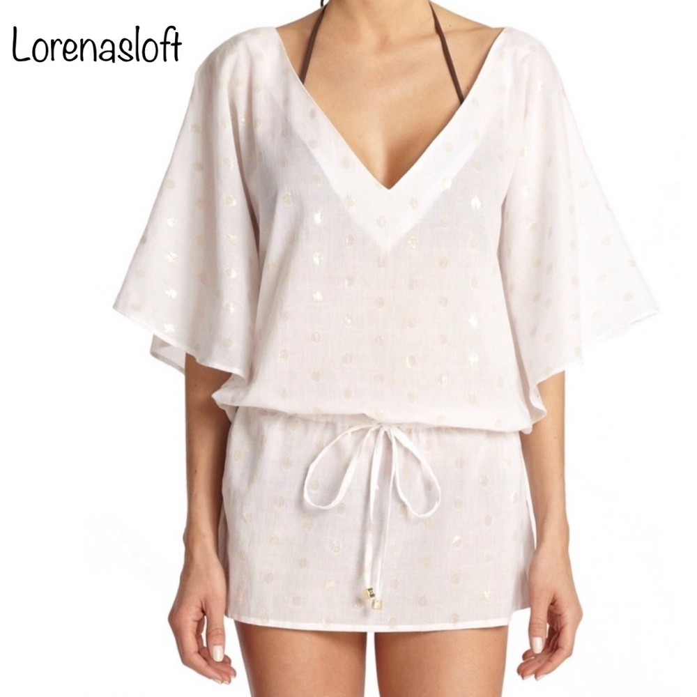 Elizabeth Hurley Light cream/gold color coverup.